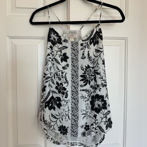 LOFT white top with black floral designs (size XS)